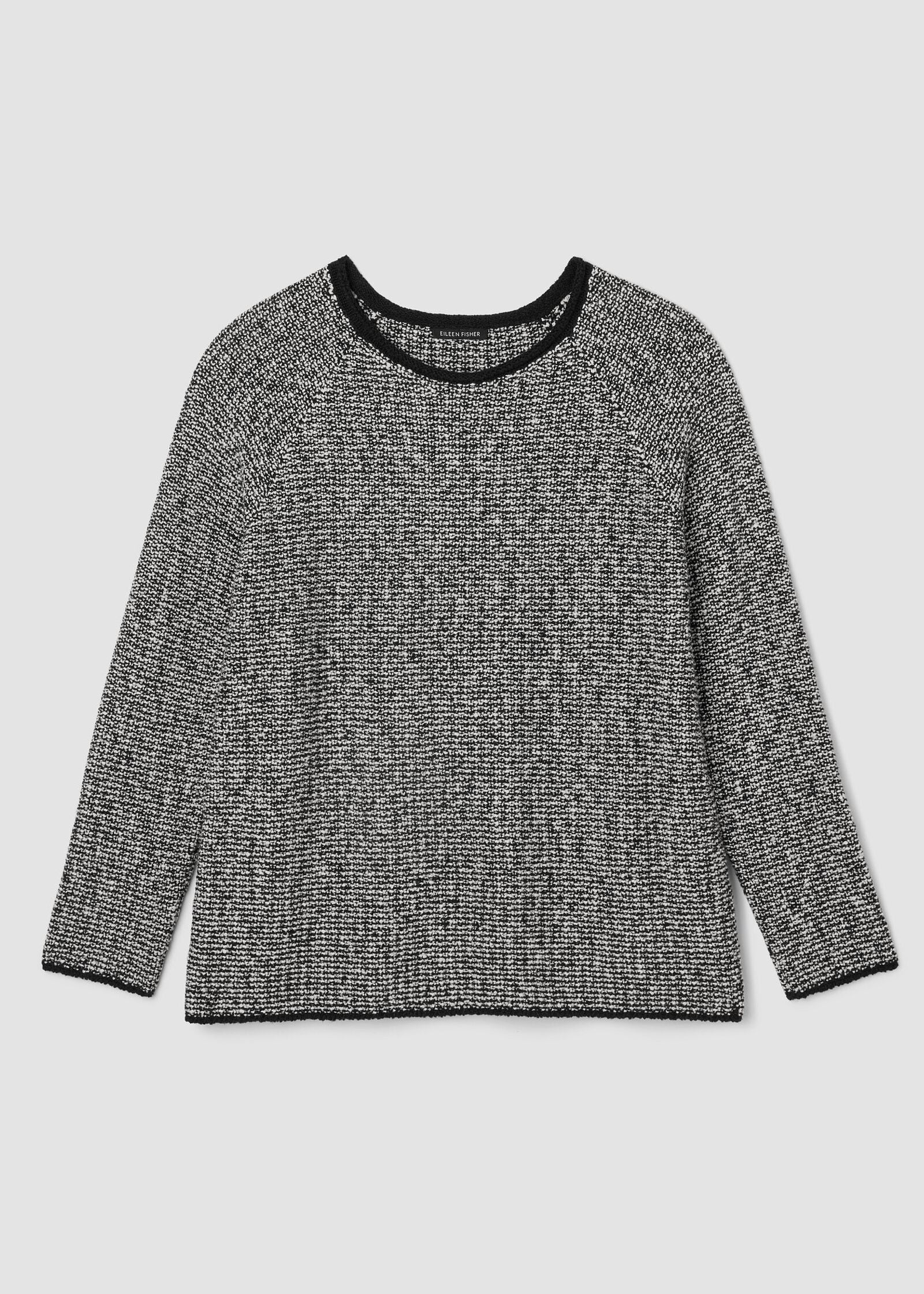 front view of plus size Eileen Fisher  Peruvian Cotton Cloud Jewel Neck Sweater in Black Soft White