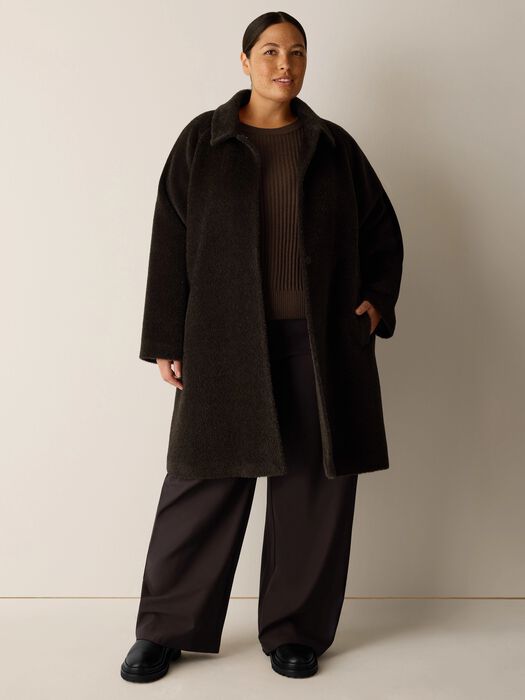 Coffee-brown long coat with classic collar and button placket, relaxed fit