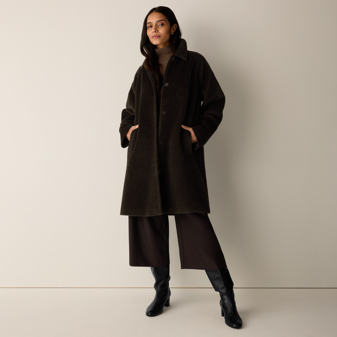 Coffee-brown long coat with classic collar and button front, side pockets
