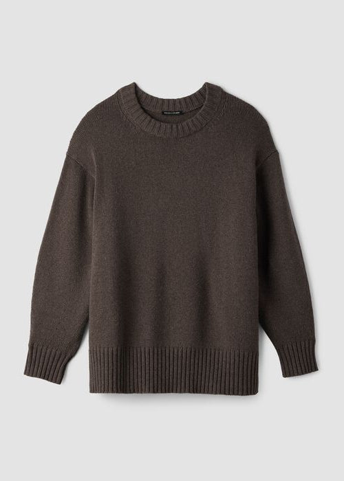 Oversized crew neck knit sweater in warm brown, flat lay view showing ribbed cuffs and hem
