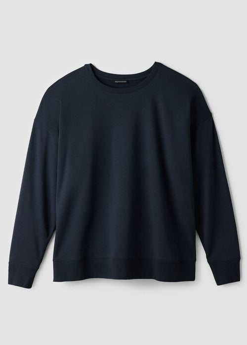 Dark navy crew neck sweatshirt with long sleeves and ribbed cuffs, flatlay view