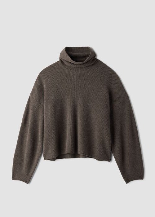 Oversized ribbed turtleneck sweater with long sleeves and relaxed boxy fit, flat lay view