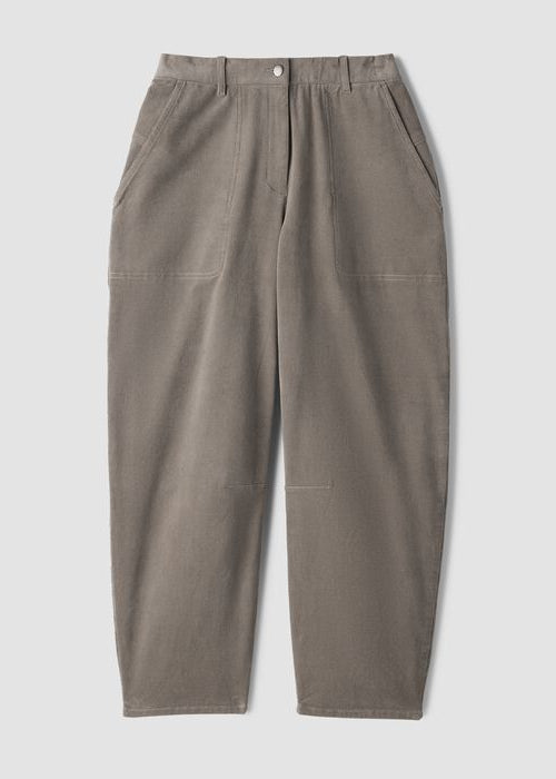 Relaxed-fit tapered ankle pants with front pockets and snap closure, flat lay view