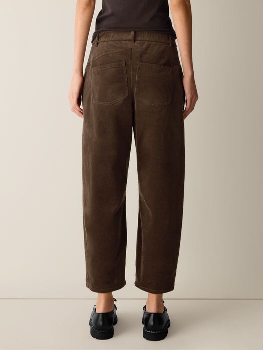 Back view corduroy ankle pants in dark hazel-brown with belt loops
