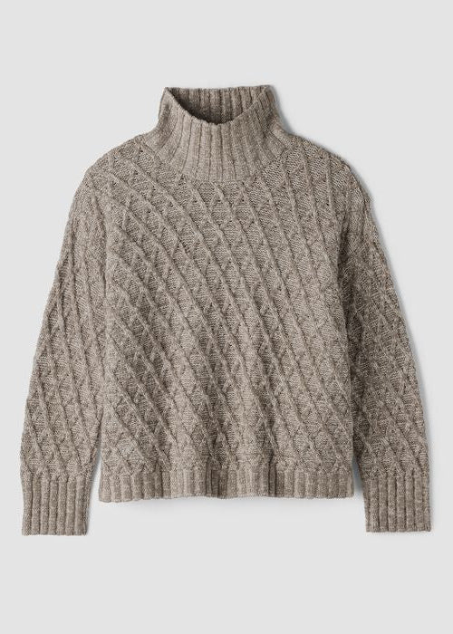 Cable-knit turtleneck sweater with argyle diamond pattern, long sleeves, ribbed cuffs and hem, flat lay view