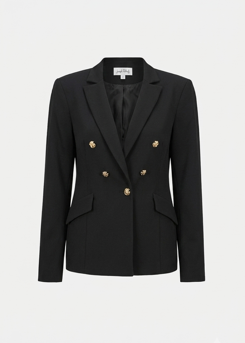 Black fitted blazer with peak lapels and brass button front