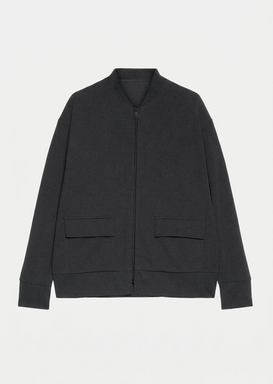 Black zip-front athleisure jacket with stand collar and two flap pockets