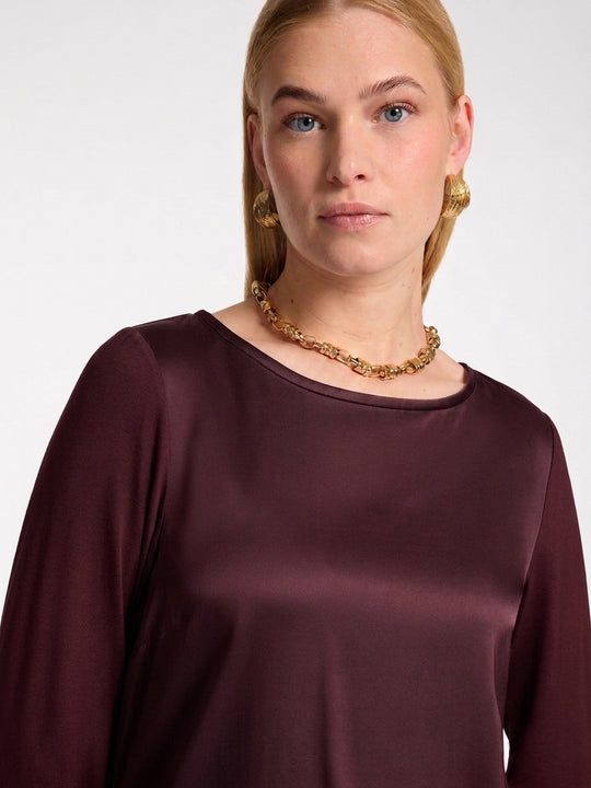 Satin boat-neck long-sleeve tee in dark plum with satin sheen