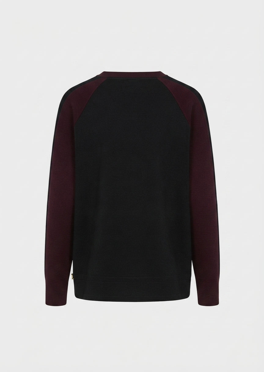 Crewneck viscose pullover with maroon stripe inlay on raglan sleeves, dark body
