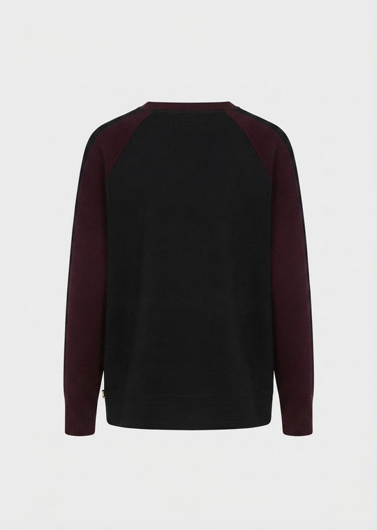 Crewneck viscose pullover with maroon stripe inlay on raglan sleeves, dark body