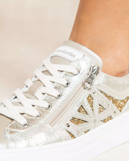 close up view of Nero Giardini Paradise Zip Closure with Lace Platform Runner in Champagne