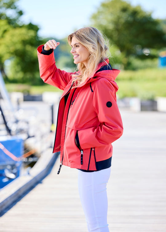 side view of plus size Junge Performance Jacket with Contrast Zipper and Trimmed Hood in Red