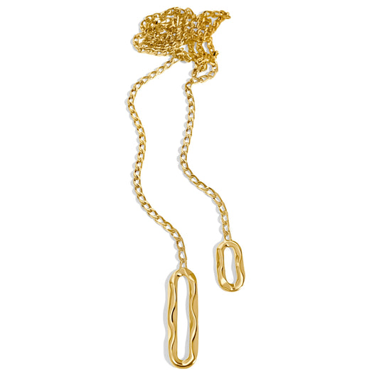 Gold chain lariat necklace with elongated oval links and adjustable ends