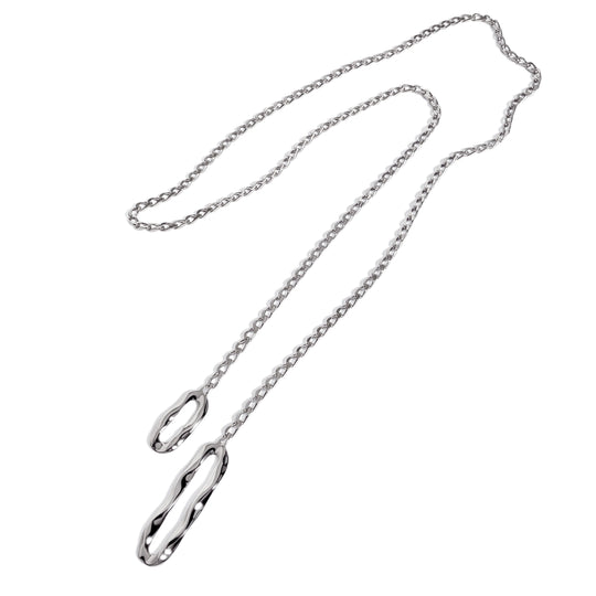 Silver chain lariat necklace with oval pendant ends on white background