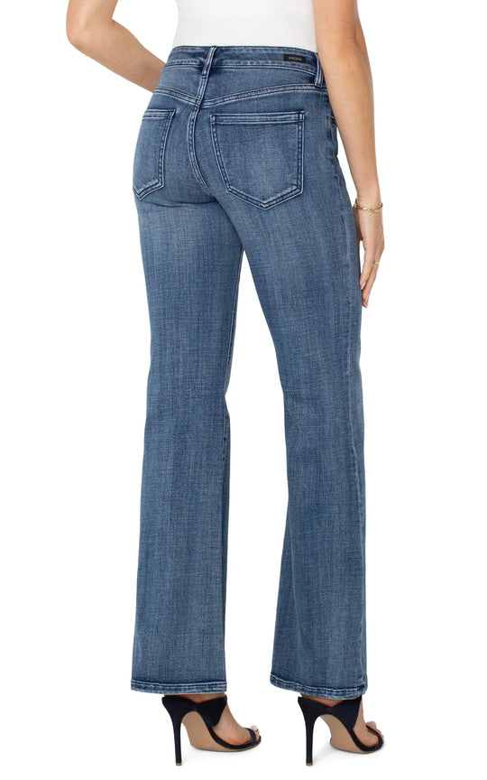 Women's blue flare jeans back view with yoke and patch pockets