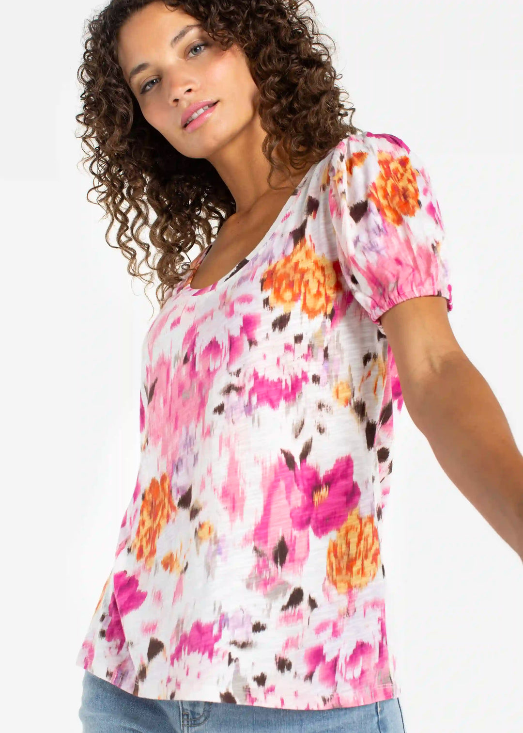 front  side view of plus size Liverpool Puff Sleeve Scoopneck Floral Knit Top in Pink Multi