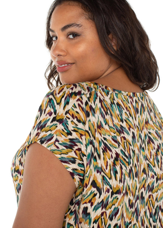 close up side view of plus size Liverpool Sleeveless Shoulder Pleat Boat Neck Knit Top in Green Multi Animal