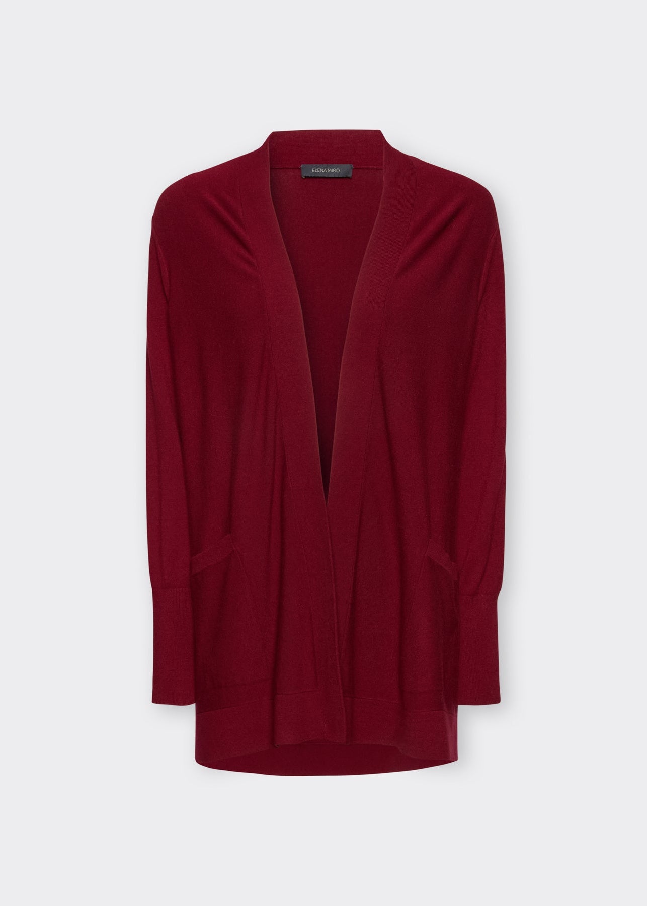Red long-sleeve open cardigan with draped lapel front, front view