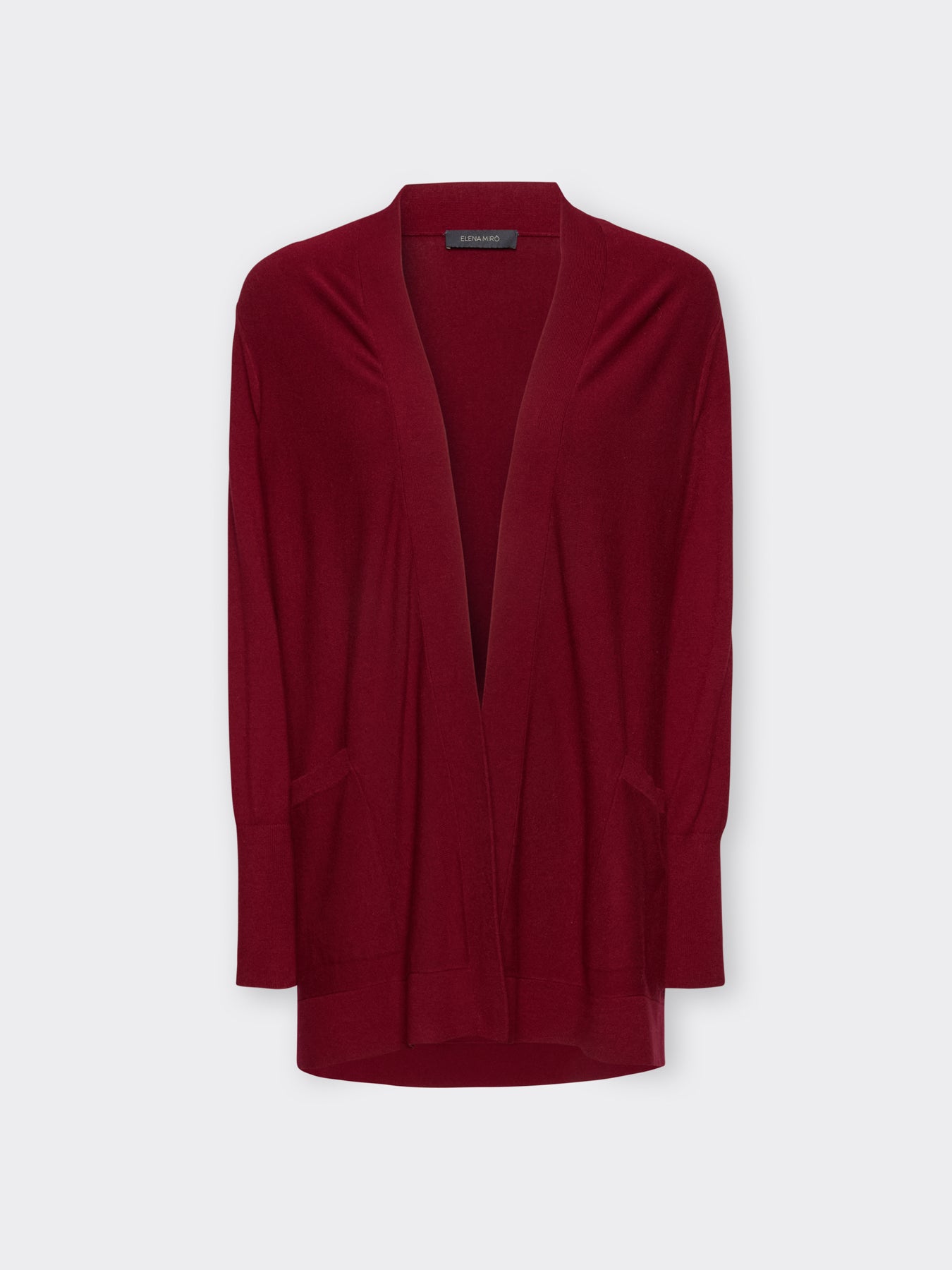 Red long-sleeve open cardigan with draped lapel front, front view