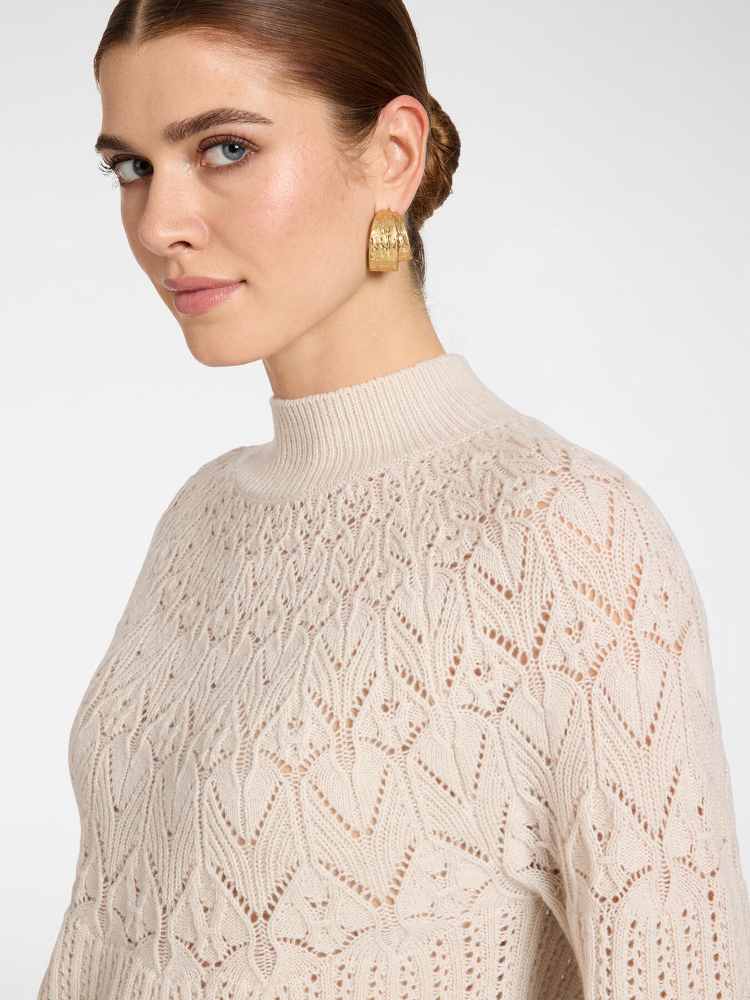 Clay perforated wool knit pullover, textured chevron pattern, crew neckline