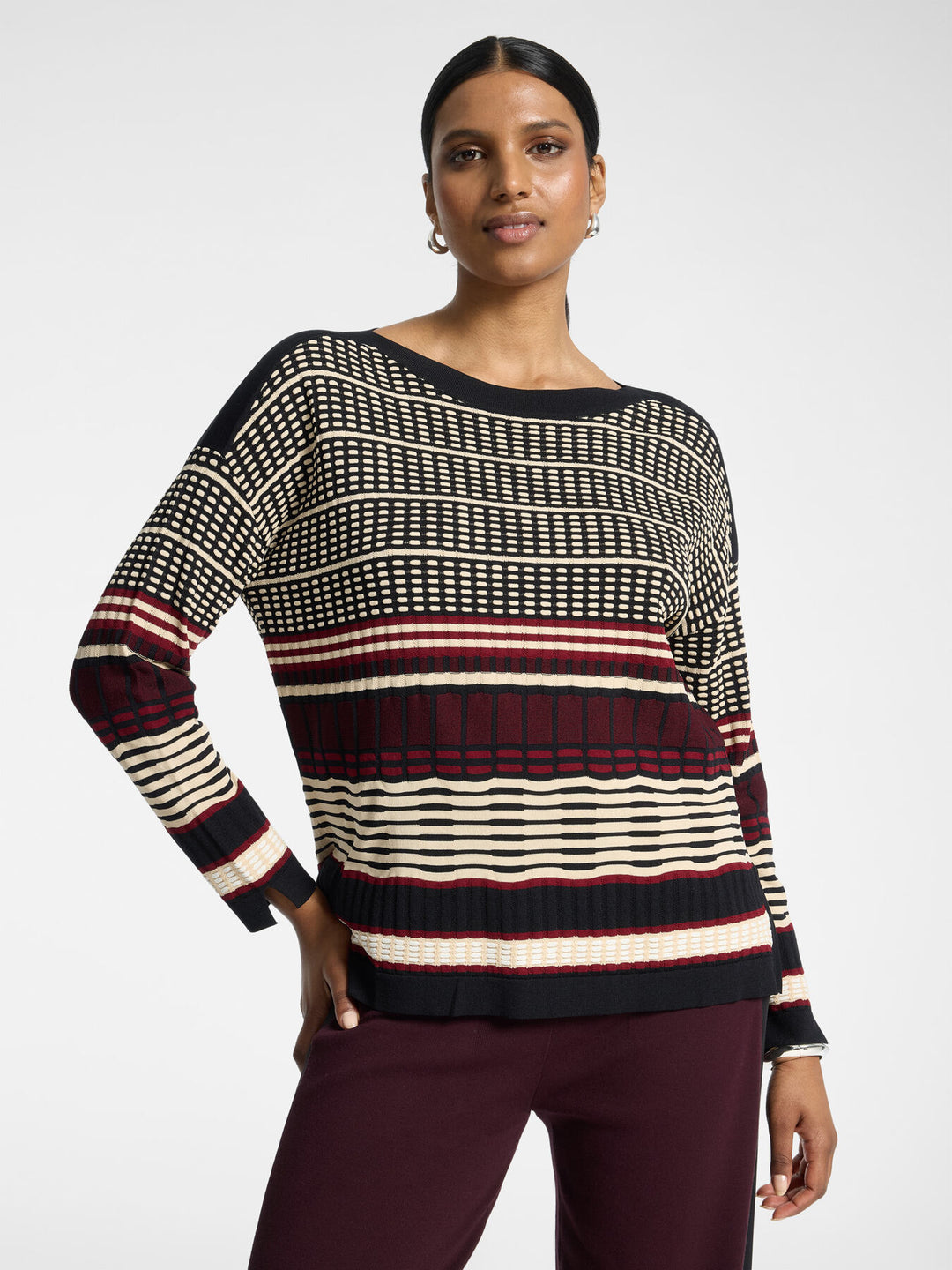 Striped jacquard pullover with crew neck, black-and-cream grid and dark red banding
