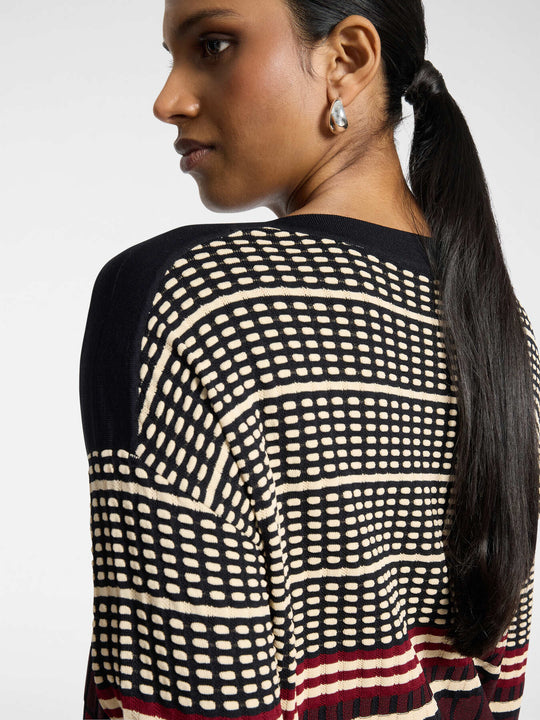 Striped jacquard pullover back, black with cream grid pattern and dark red stripe