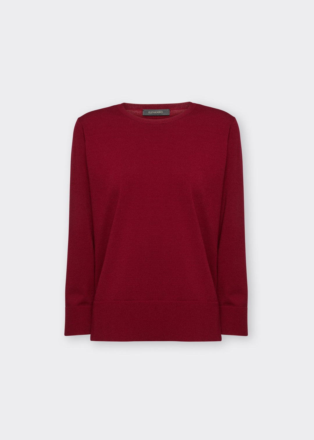 Red long-sleeve jersey pullover with crew neckline and straight hem