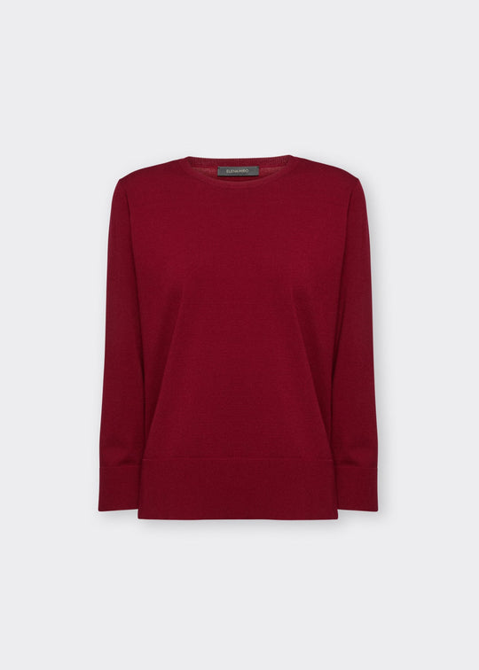 Red long-sleeve jersey pullover with crew neckline and straight hem