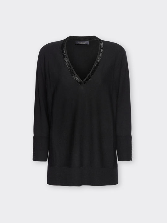 Black V-neck tunic with hand-embroidered trim and 3/4 kimono sleeves