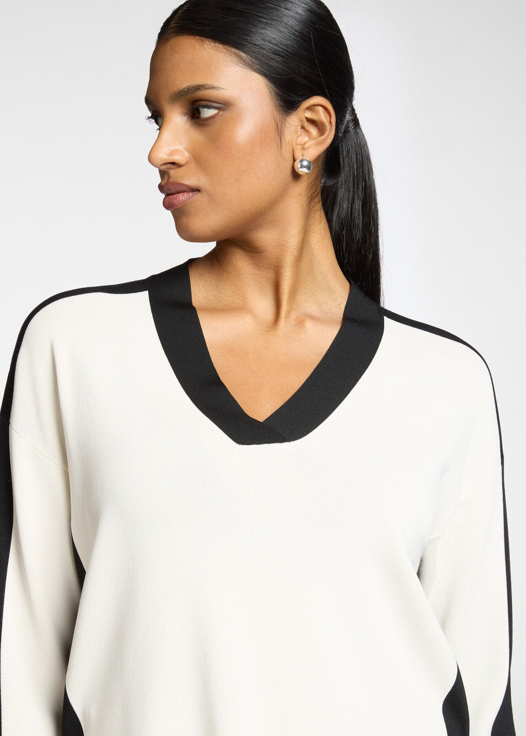 Front view of plus size Elena Miro Bi Color Compact Viscose V-Neck Sweater in Juta Black