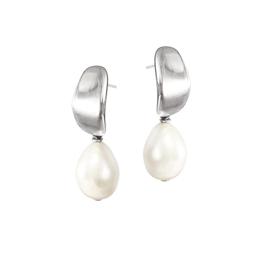 Silver curved stud earrings with dangling white pearl drops on clean background