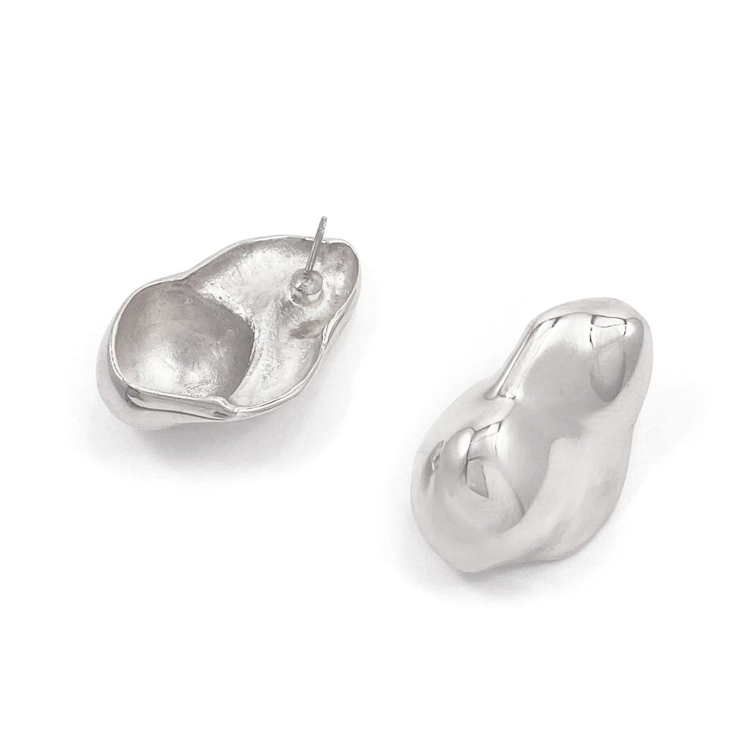 Two irregular molten-shaped stud earrings in metallic finish, one showing front view, one showing back