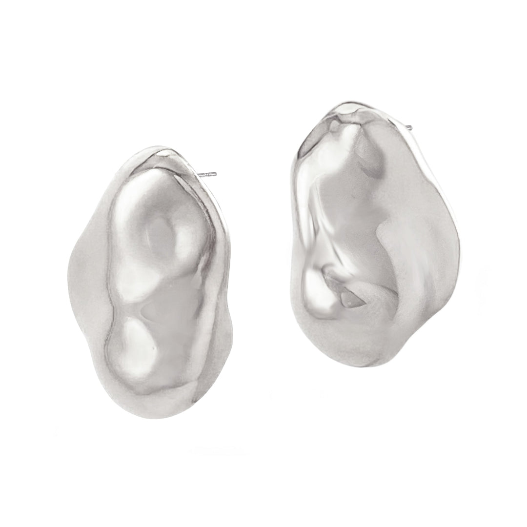 Two organic shaped molten-style stud earrings with hammered metallic finish on white background
