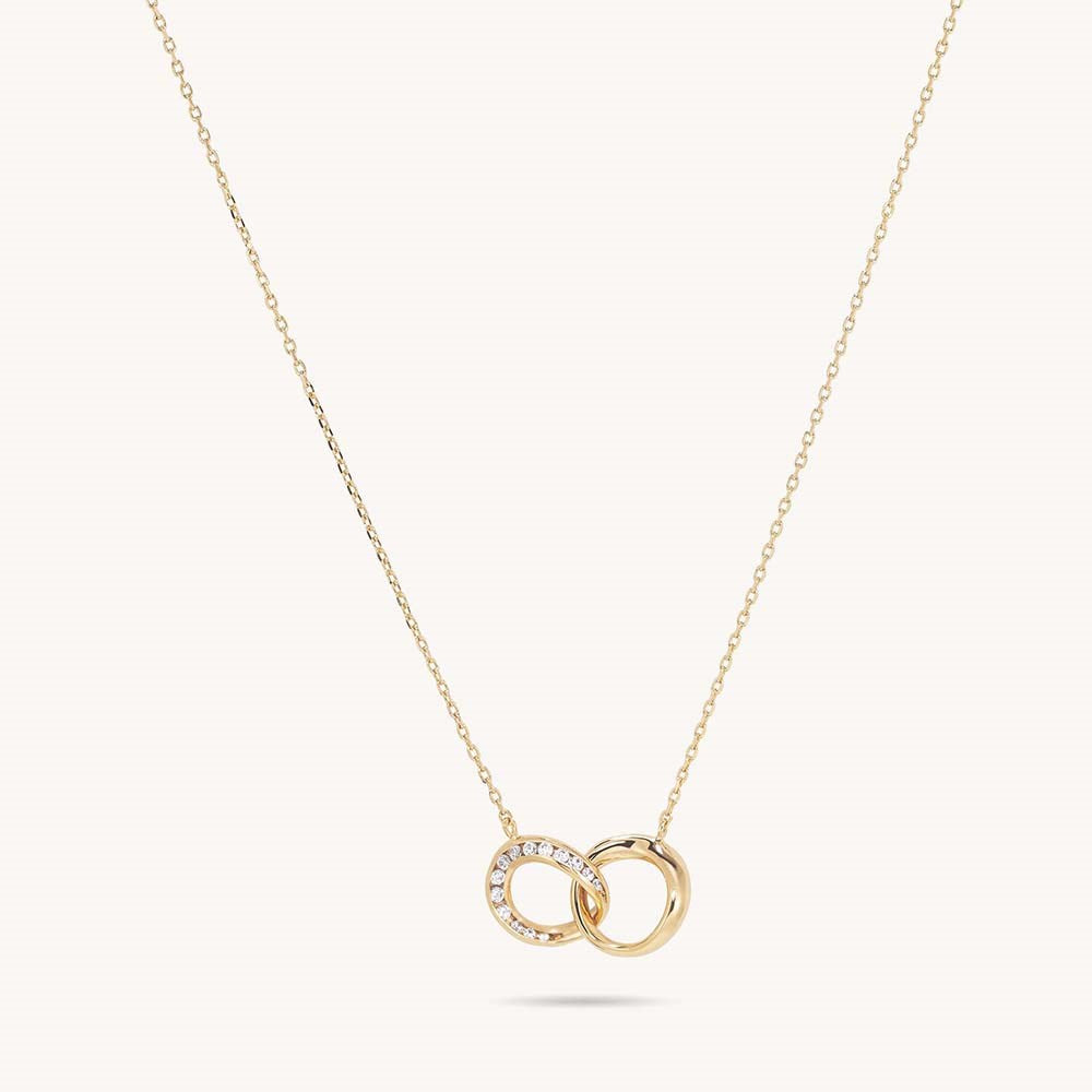 Gold interlocking double circle pendant necklace with diamond-set ring on delicate chain