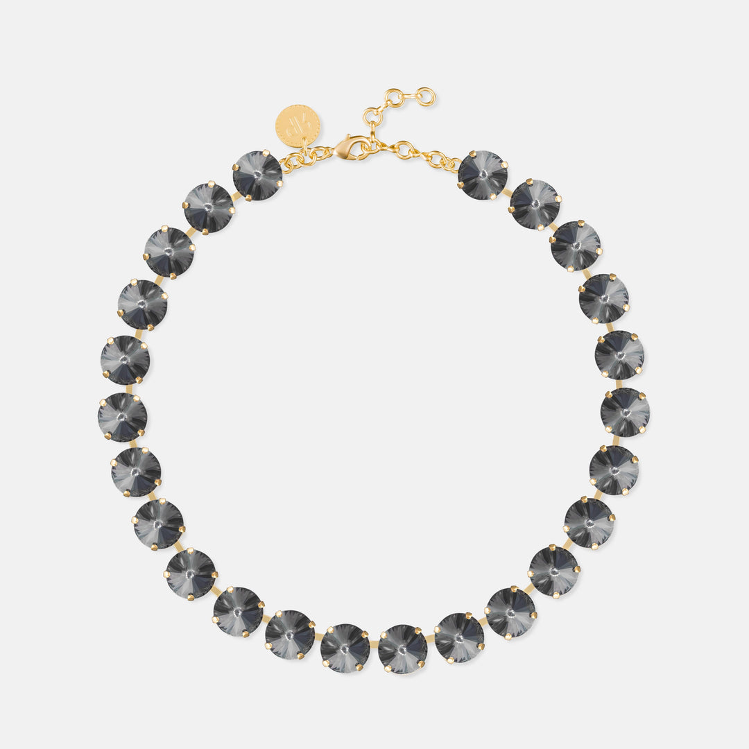 Round dark gray crystal rivoli necklace with gold prong settings and lobster clasp closure