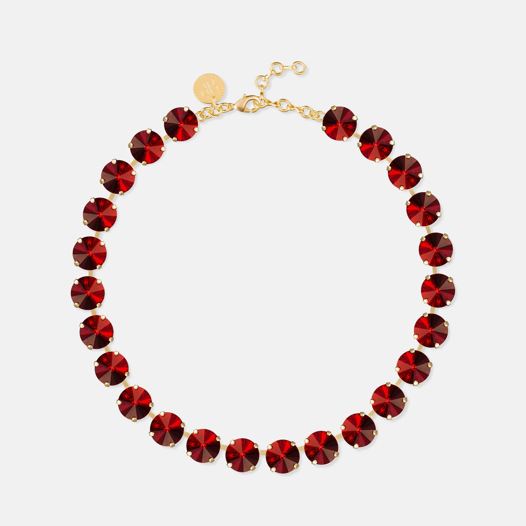 Ruby red faceted rivoli tennis necklace with gold-tone clasp and oval stones