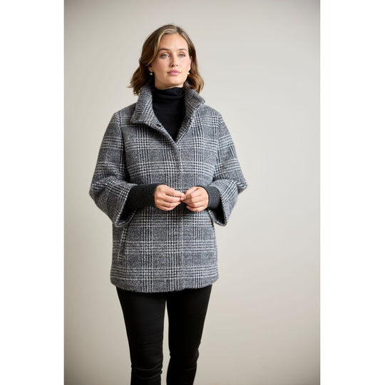 Glen plaid oversized jacket with ribbed sleeve cuffs and wide lapel collar, front view on model