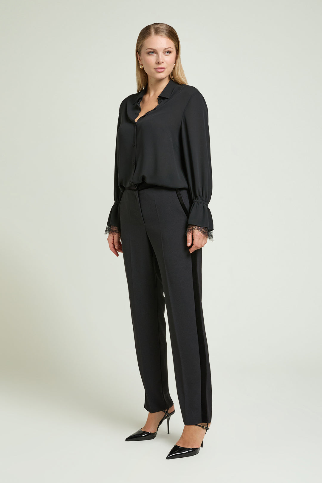 Black crepe tuxedo blazer with velvet lapels and long sleeves