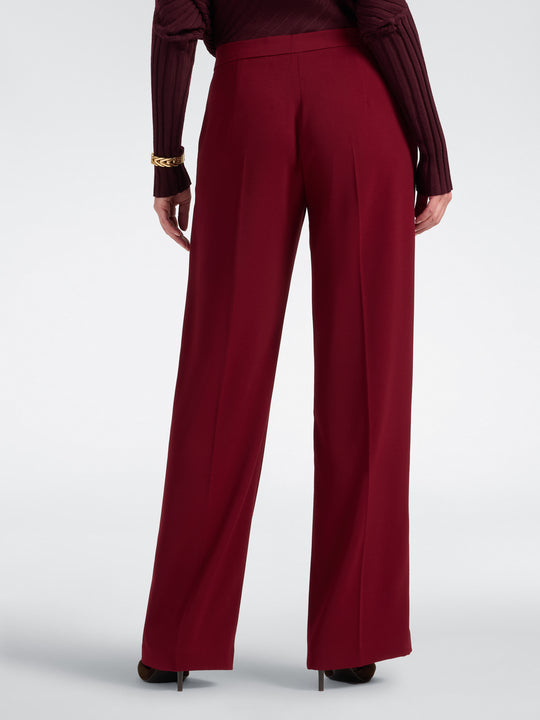 Men's deep red stretch crepe trousers with wide legs and flat front