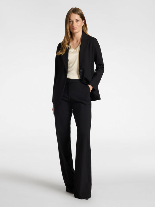 Men's black tailored trousers, wide-leg silhouette with side pockets