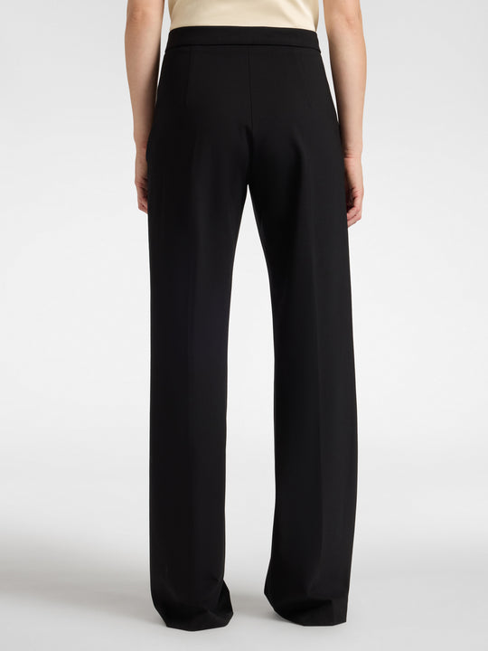 Men's black trousers with high waist and relaxed wide legs