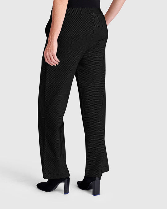 Wide-leg pull-on pants with fine stripe texture, shown from back on model wearing heeled boots