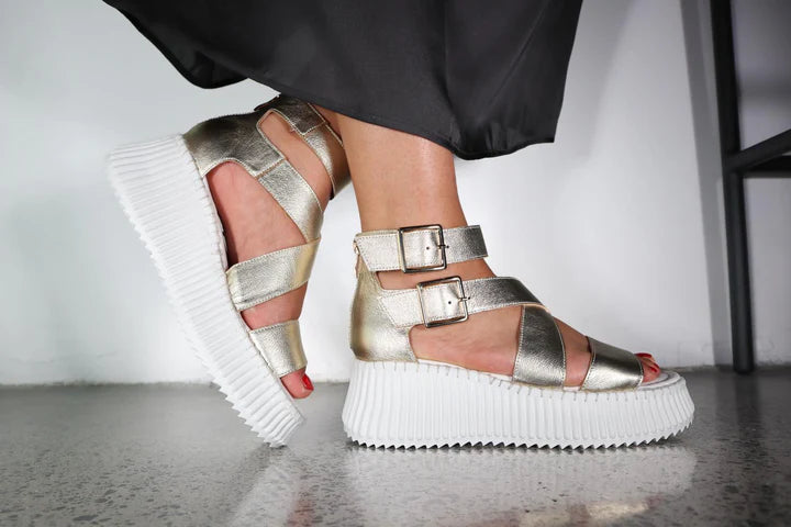 side view of Minx Plaza Platform with Ankle Strap in Soft Gold