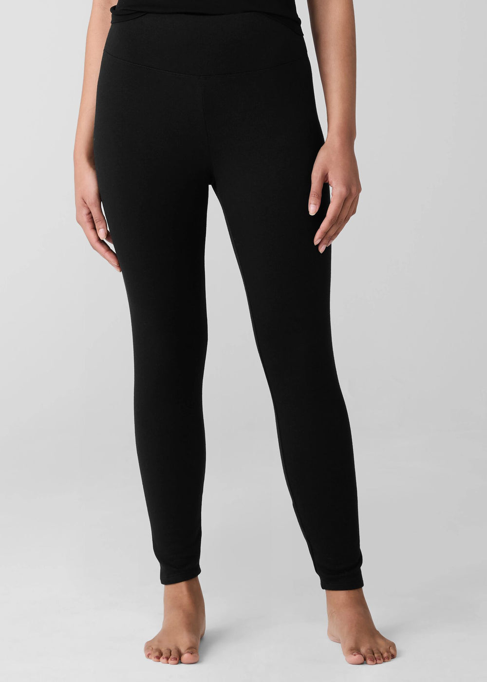 front view of plus size Eileen Fisher Cozy Brushed Terry Hug High Waited Ankle Legging in Black