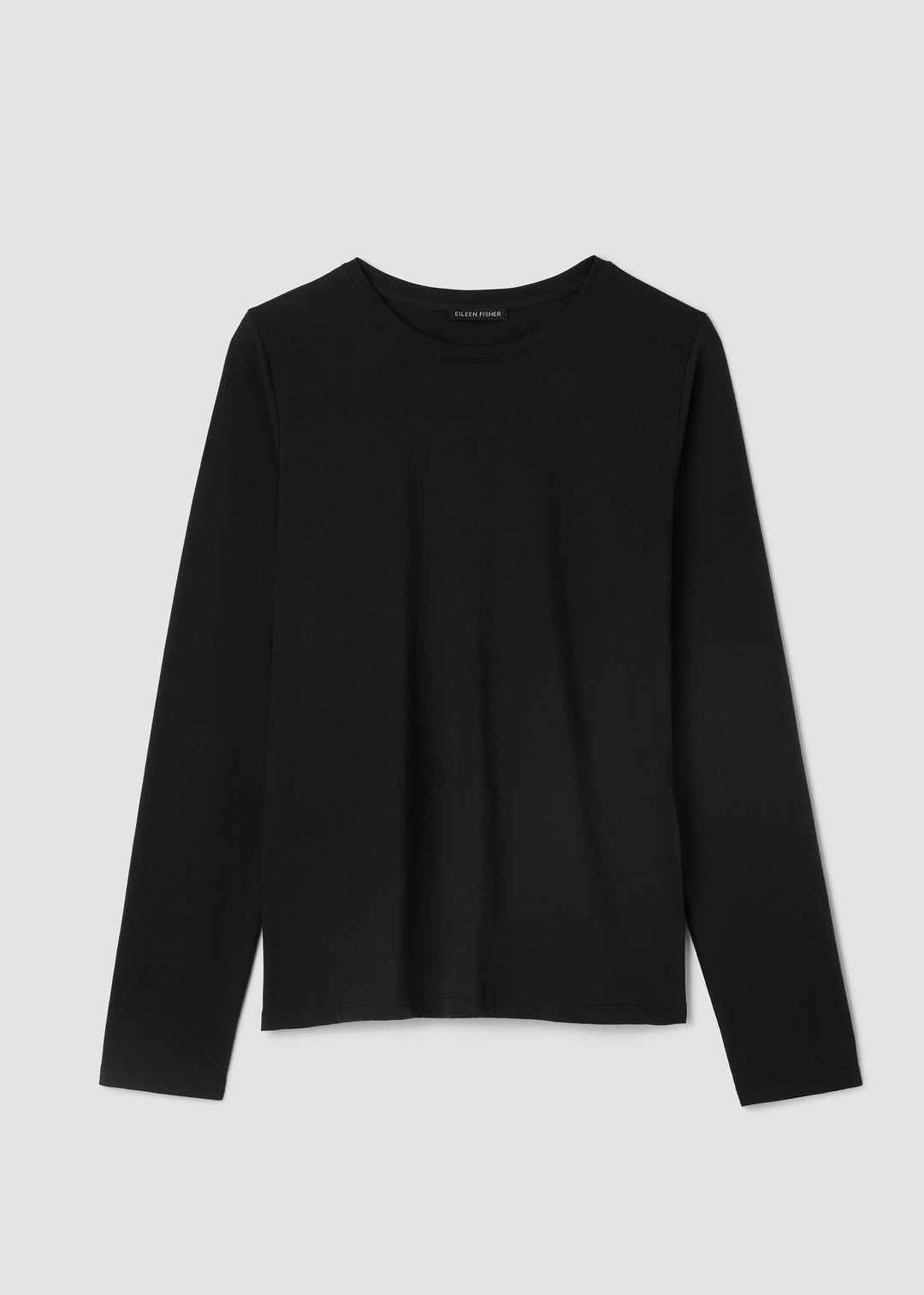 Black long-sleeve shirt on a light gray background