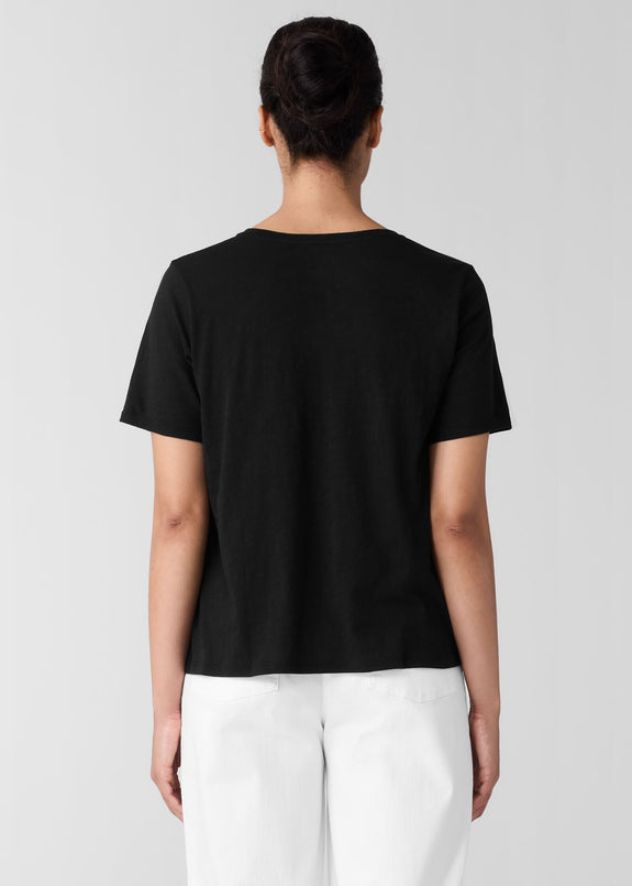 back view of plus size Eileen Fisher Organic Cotton Slubby Jersey V-Neck Short Sleeve Tee in Black