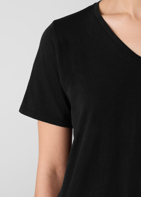 close up front view of plus size Eileen Fisher Organic Cotton Slubby Jersey V-Neck Short Sleeve Tee in Black
