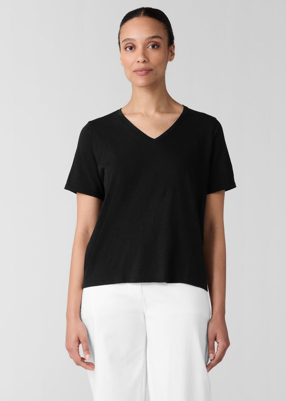 front view of plus size Eileen Fisher Organic Cotton Slubby Jersey V-Neck Short Sleeve Tee in Black