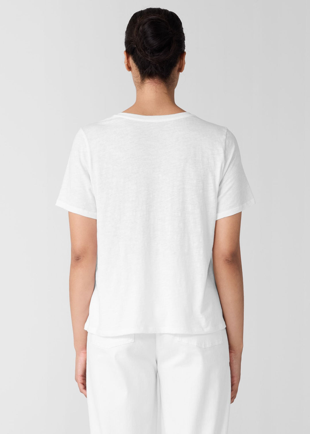 back view of Eileen Fisher Organic Cotton Slubby Jersey V-Neck Short Sleeve Tee in White