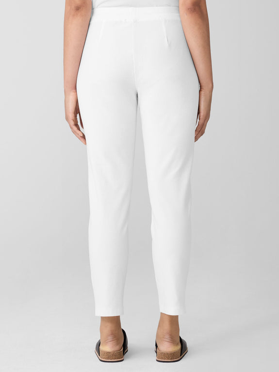 back view of Eileen Fisher stretch crepe slim leg pull on plus size pant in white